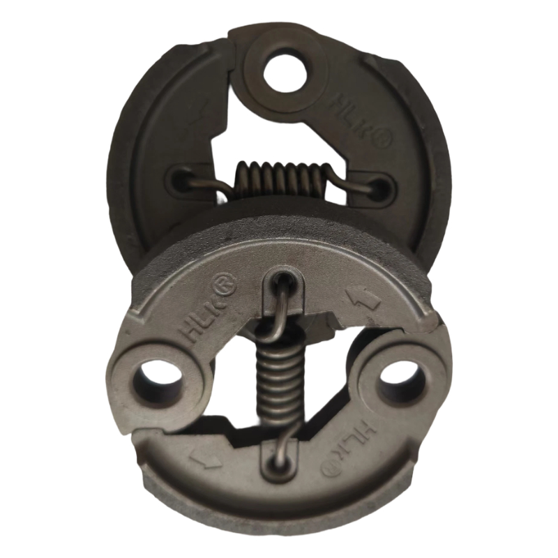 How does powder metallurgy technology enhance the impact and high-temperature resistance of a lawn mower clutch?